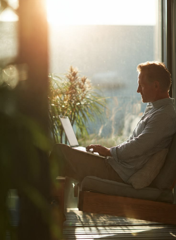 Writer by a window